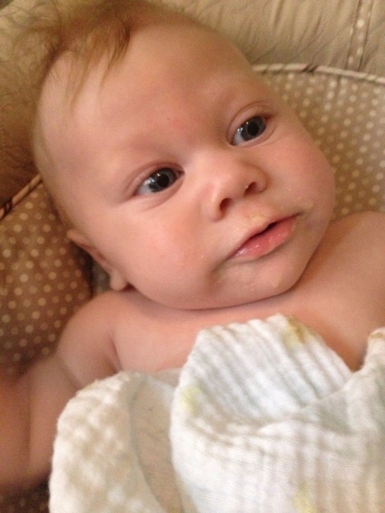 First feeding of rice cereal mixed with breast milk